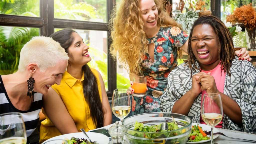 People enjoying an educational dinner